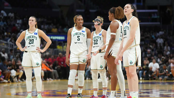 Aug 28, 2024; Los Angeles, California, USA; New York Liberty guard Sabrina Ionescu (20), forward Kayla Thornton (5), guard Courtney Vandersloot (22), forward Nyara Sabally (8) and forward Breanna Stewart (30) react in the second half against the LA Sparks at Crypto.com Arena. Mandatory Credit: Kirby Lee-Imagn Images Aug 28, 2024; Los Angeles, California, USA; New York Liberty guard Sabrina Ionescu (20), forward Kayla Thornton (5), guard Courtney Vandersloot (22), forward Nyara Sabally (8) and forward Breanna Stewart (30) react in the second half against the LA Sparks at Crypto.com Arena. Mandatory Credit: Kirby Lee-Imagn Images