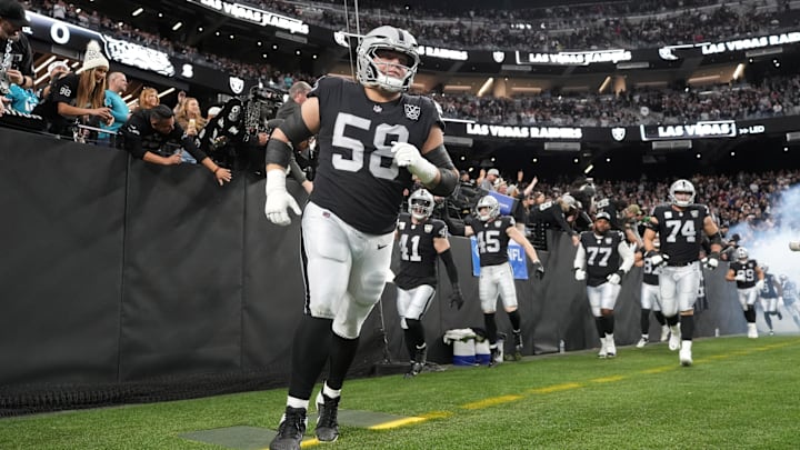 Dec 22, 2024; Paradise, Nevada, USA; Las Vegas Raiders guard Jackson Powers-Johnson (58) enters the field before the game against the Jacksonville Jaguars at Allegiant Stadium. Mandatory Credit: Kirby Lee-Imagn Images