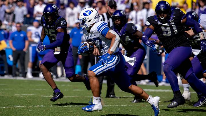 Oct 14, 2023; Fort Worth, Texas, USA; Brigham Young Cougars running back LJ Martin (27) runs with the ball against the TCU Horned Frogs during the game at Amon G. Carter Stadium. Mandatory Credit: Jerome Miron-USA TODAY Sports