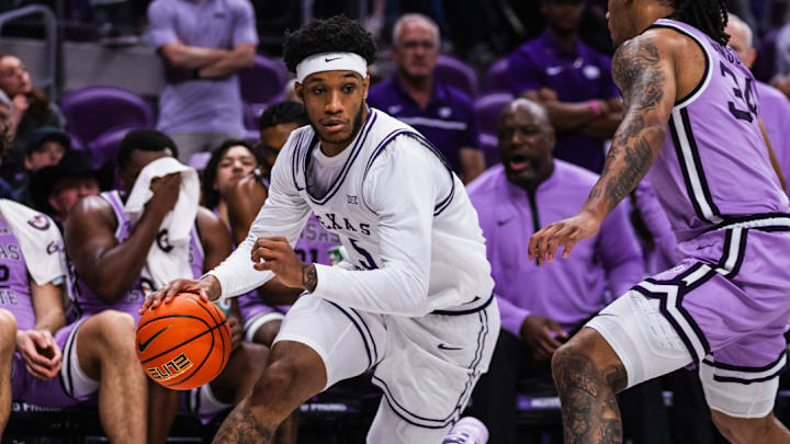 Micah Robinson drives the ball in a 84-82 TCU win over Kansas State on Saturday, February 7, 2026.
