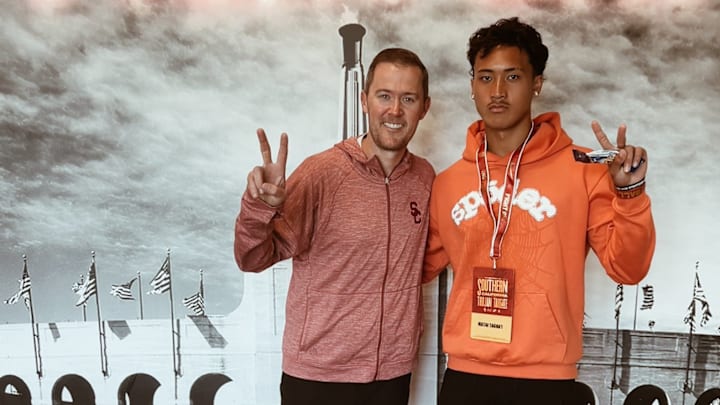USC linebacker commit Matai Tagoa'i posing with Trojans' coach Lincoln Riley. USC linebacker commit Matai Tagoa'i posing with Trojans' coach Lincoln Riley.