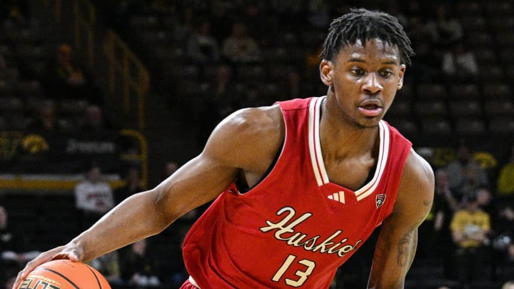 Dec 29, 2023; Iowa City, Iowa, USA; Northern Illinois Huskies forward Xavier Amos (13) in action against the Iowa Hawkeyes during the first half at Carver-Hawkeye Arena. Mandatory Credit: Jeffrey Becker-USA TODAY Sports Dec 29, 2023; Iowa City, Iowa, USA; Northern Illinois Huskies forward Xavier Amos (13) in action against the Iowa Hawkeyes during the first half at Carver-Hawkeye Arena. Mandatory Credit: Jeffrey Becker-USA TODAY Sports