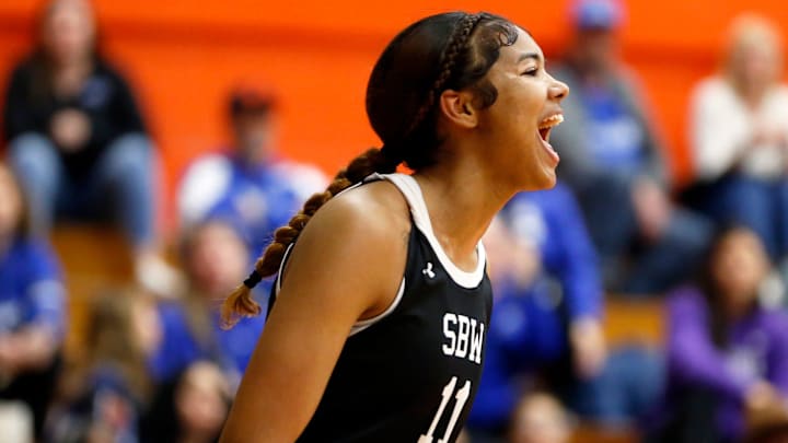 South Bend Washington junior Kira Reynolds celebrates