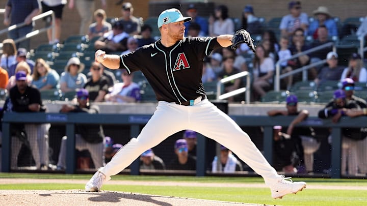 Arizona Diamondbacks pitcher Corbin Burnes throws to the Colorado Rockies in his debut on opening day of the spring training season at Salt River Fields at Talking Stick in Scottsdale on Feb. 21, 2025. Arizona Diamondbacks pitcher Corbin Burnes throws to the Colorado Rockies in his debut on opening day of the spring training season at Salt River Fields at Talking Stick in Scottsdale on Feb. 21, 2025.