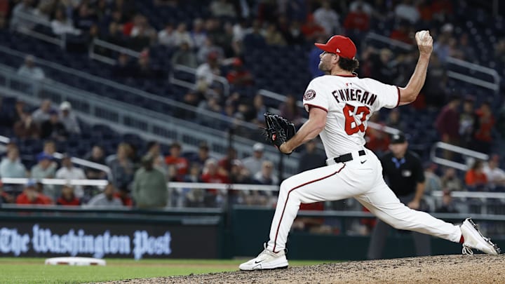 Washington, District of Columbia, USA; Washington Nationals closing pitcher Kyle Finnegan (67) pitches against the Atlanta Braves during the ninth inning at Nationals Park.