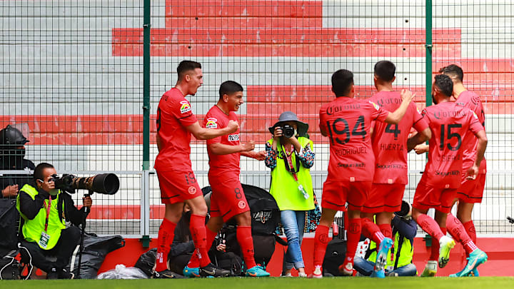Jugadores del Toluca celebran un gol ante Puebla. Jugadores del Toluca celebran un gol ante Puebla.