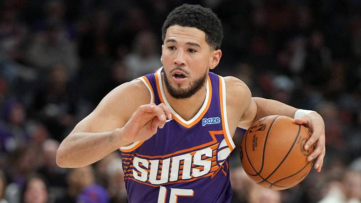 Oct 24, 2026; Phoenix, Arizona, USA; Phoenix Suns guard Devin Booker (15) drives against the Golden State Warriors in the second half at Mortgage Matchup Center. Mandatory Credit: Rick Scuteri-Imagn Images Oct 24, 2026; Phoenix, Arizona, USA; Phoenix Suns guard Devin Booker (15) drives against the Golden State Warriors in the second half at Mortgage Matchup Center. Mandatory Credit: Rick Scuteri-Imagn Images