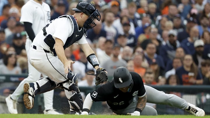 Chicago White Sox catcher Korey Lee (26) is tagged out by  Detroit Tigers catcher Jake Rogers (34) in the sixth inning at Comerica Park on Sept. 29, 2024.