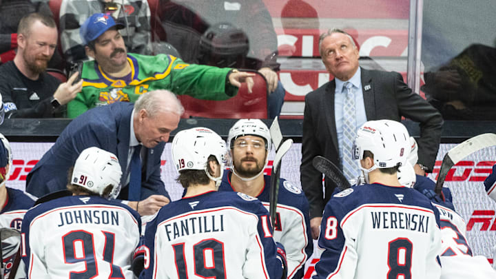 Mar 29, 2025; Ottawa, Ontario, CAN; Columbus Blue Jackets head coach Dean Evason looks up at a replay during a timeout in the third period against the Ottawa Senators at the Canadian Tire Centre. Mandatory Credit: Marc DesRosiers-Imagn Images