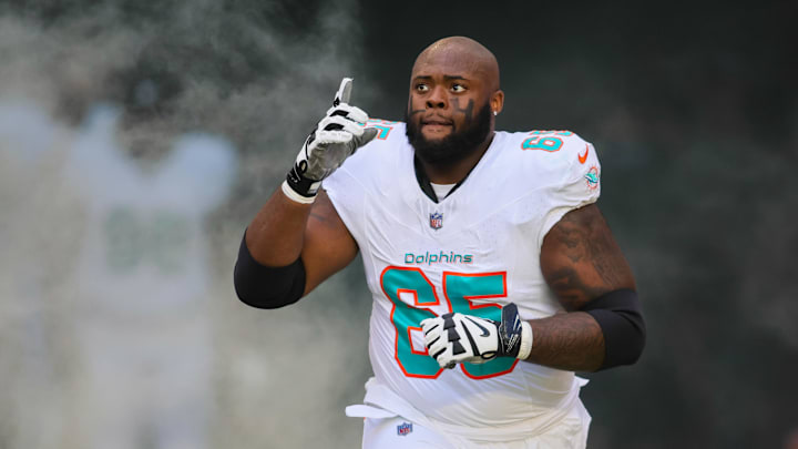Miami Dolphins guard Robert Jones enters the field to take on the New York Jets at Hard Rock Stadium. Miami Dolphins guard Robert Jones enters the field to take on the New York Jets at Hard Rock Stadium.