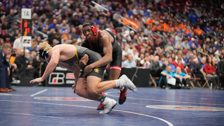 Fort Dodge's Dreshaun Ross and Southeast Polk's Holden Hansen during the 3A-215 final Saturday, Feb. 17, 2024, at Wells Fargo Arena.