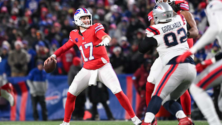 Dec 22, 2024; Orchard Park, New York, USA; Buffalo Bills quarterback Josh Allen (17) prepares to throw a pass against the New England Patriots in the third quarter at Highmark Stadium. Mandatory Credit: Mark Konezny-Imagn Images