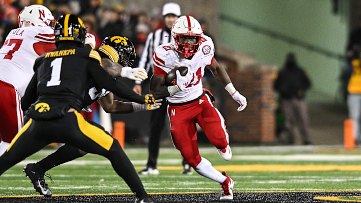 Nebraska running back Emmett Johnson carries the ball against the Iowa Hawkeyes on Nov. 29, 2024.