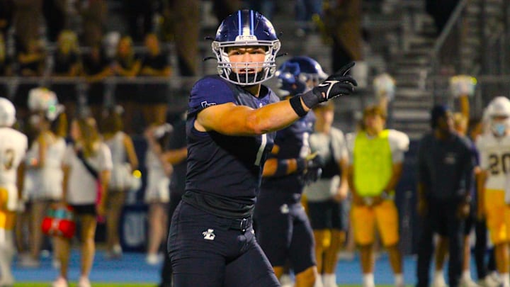 Cooper Witten checking the play. (October 10, 2025)