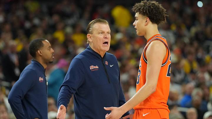 Apr 4, 2026; Indianapolis, IN, USA; Illinois Fighting Illini head coach Brad Underwood talks with Illinois Fighting Illini guard Keaton Wagler (23) against the Connecticut Huskies in the first half during a semifinal of the Final Four of the men's 2026 NCAA Tournament at Lucas Oil Stadium. Mandatory Credit: Robert Deutsch-Imagn Images Apr 4, 2026; Indianapolis, IN, USA; Illinois Fighting Illini head coach Brad Underwood talks with Illinois Fighting Illini guard Keaton Wagler (23) against the Connecticut Huskies in the first half during a semifinal of the Final Four of the men's 2026 NCAA Tournament at Lucas Oil Stadium. Mandatory Credit: Robert Deutsch-Imagn Images