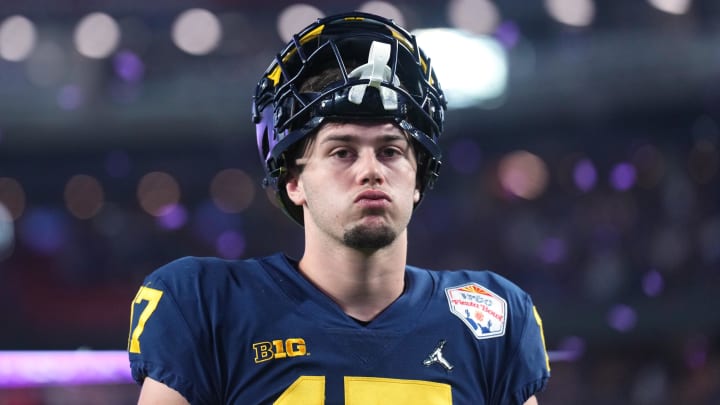 Dec 31, 2022; Glendale, Arizona, USA; Michigan Wolverines tight end Marlin Klein (17) walks off the field after losing to the TCU Horned Frogs in the 2022 Fiesta Bowl at State Farm Stadium. Mandatory Credit: Joe Camporeale-USA TODAY Sports