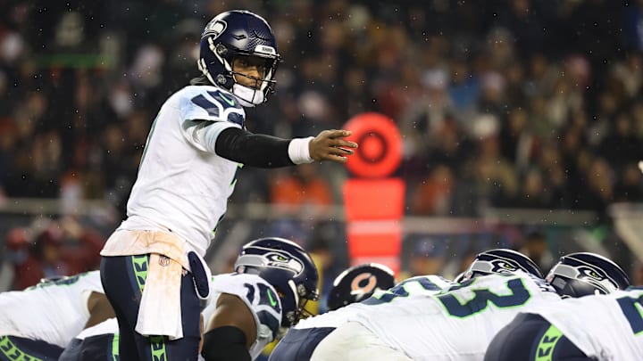 Dec 26, 2024; Chicago, Illinois, USA; Seattle Seahawks quarterback Geno Smith (7) directs a play prior to the snap during the fourth quarter against the Chicago Bears at Soldier Field. Mandatory Credit: Talia Sprague-Imagn Images
