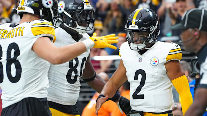 Oct 13, 2024; Paradise, Nevada, USA; Pittsburgh Steelers quarterback Justin Fields (2) celebrates with team mates after scoring a rushing touchdown against the Las Vegas Raiders during the second quarter at Allegiant Stadium. Mandatory Credit: Stephen R. Sylvanie-Imagn Images