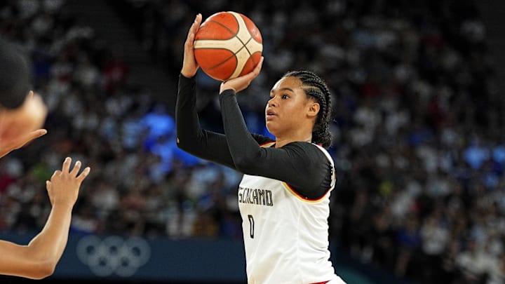 Germany forward Satou Sabally (0) shoots the ball against France in the women’s basketball quarterfinals during the Paris 2024 Olympic Summer Games at Accor Arena. Germany forward Satou Sabally (0) shoots the ball against France in the women’s basketball quarterfinals during the Paris 2024 Olympic Summer Games at Accor Arena.