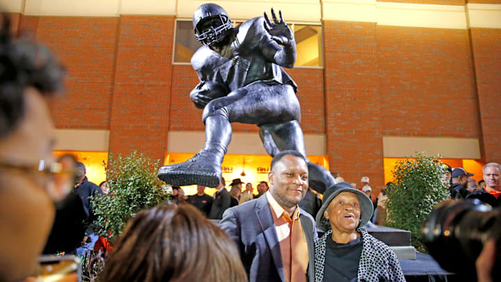 Barry Sanders poses with his mom, Shirley Sanders, during a statue unveiling before Saturday's OSU-TCU football game in Stillwater.

sanders1