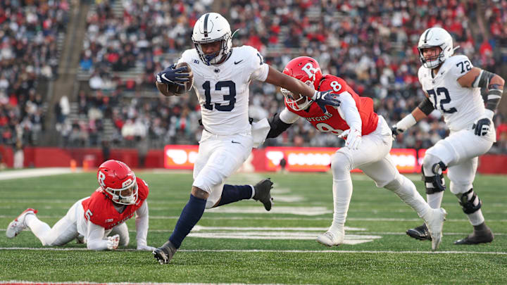 Nov 29, 2025; Piscataway, New Jersey, USA; Penn State Nittany Lions running back Kaytron Allen (13) scores a rushing touchdown during the first half against the Rutgers Scarlet Knights at SHI Stadium. Mandatory Credit: Vincent Carchietta-Imagn Images Nov 29, 2025; Piscataway, New Jersey, USA; Penn State Nittany Lions running back Kaytron Allen (13) scores a rushing touchdown during the first half against the Rutgers Scarlet Knights at SHI Stadium. Mandatory Credit: Vincent Carchietta-Imagn Images