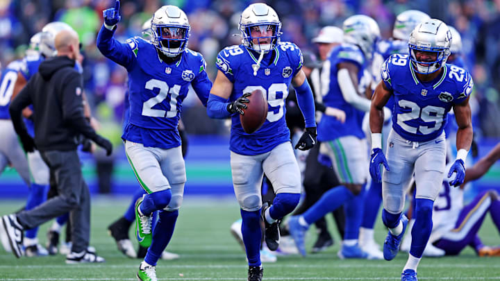 Seattle Seahawks safety Ty Okada (39) celebrates after retrieving a fumble.