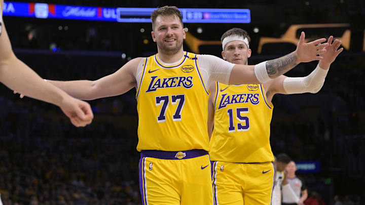 Feb 10, 2025; Los Angeles, California, USA; Los Angeles Lakers guard Luka Doncic (77) and guard Austin Reaves (15) react after a basket against the Utah Jazz at Crypto.com Arena. Mandatory Credit: Jayne Kamin-Oncea-Imagn Images Feb 10, 2025; Los Angeles, California, USA; Los Angeles Lakers guard Luka Doncic (77) and guard Austin Reaves (15) react after a basket against the Utah Jazz at Crypto.com Arena. Mandatory Credit: Jayne Kamin-Oncea-Imagn Images