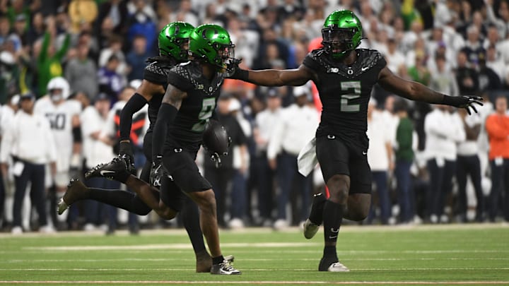 Dec 7, 2024; Indianapolis, IN, USA; Oregon Ducks defensive back Nikko Reed (9) reacts after an interception against the Penn State Nittany Lions during the fourth quarter in the 2024 Big Ten Championship game at Lucas Oil Stadium.