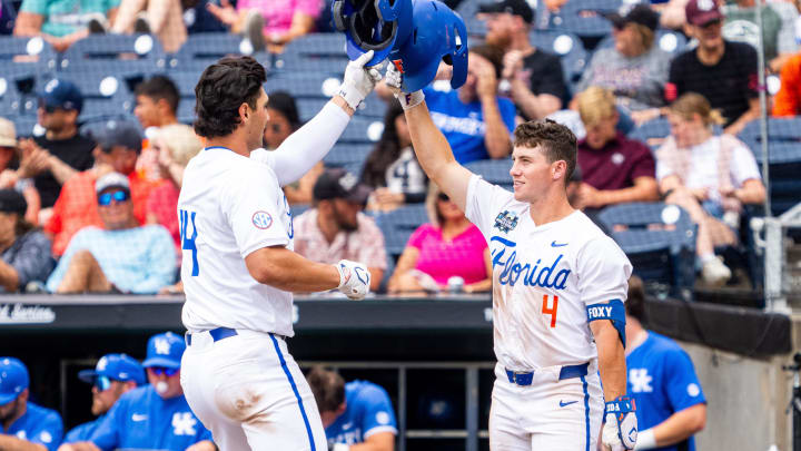 Florida Gators first baseman Jac Caglianone (14) and second baseman Cade Kurland (4) celebrate after hitting a home run against the Kentucky Wildcats 