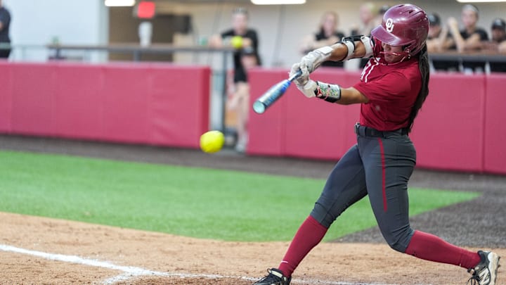 Oklahoma’s Ailana Agbayani hits a single during a fall ball scrimmage. Oklahoma’s Ailana Agbayani hits a single during a fall ball scrimmage.