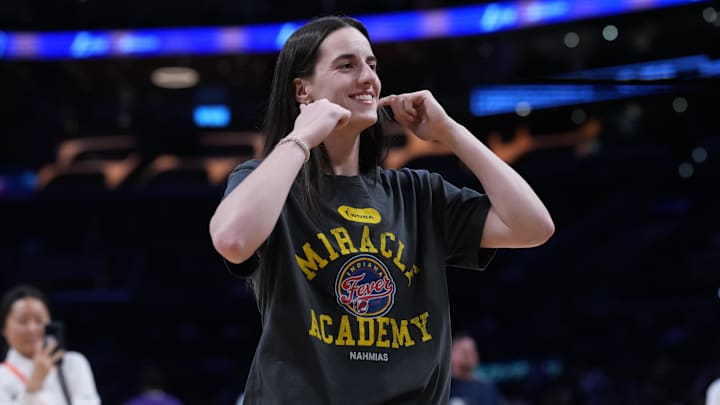 Aug 5, 2025; Los Angeles, California, USA; Indiana Fever guard Caitlin Clark (22) interacts with the fans during pregame warmups against the LA Sparks at Crypto.com Arena. Mandatory Credit: Kirby Lee-Imagn Images