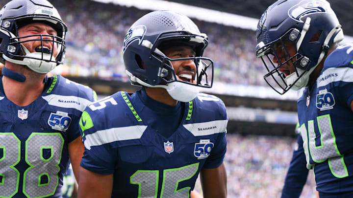 Sep 21, 2025; Seattle, Washington, USA; Seattle Seahawks wide receiver Tory Horton (15) celebrates after scoring a 95 yard punt return for a touchdown against the New Orleans Saints during the first quarter at Lumen Field. Mandatory Credit: Steven Bisig-Imagn Images