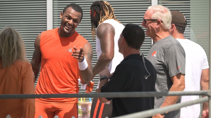 Jul 28, 2022; Berea, OH, USA; Cleveland Browns quarterback Deshaun Watson (4) talks with managing and principal partners Dee, left and Jimmy Haslam and Ian Rapoport during training camp at CrossCountry Mortgage Campus. Mandatory Credit: Ken Blaze-Imagn Images Jul 28, 2022; Berea, OH, USA; Cleveland Browns quarterback Deshaun Watson (4) talks with managing and principal partners Dee, left and Jimmy Haslam and Ian Rapoport during training camp at CrossCountry Mortgage Campus. Mandatory Credit: Ken Blaze-Imagn Images