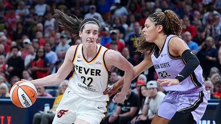 Indiana Fever guard Caitlin Clark drives to the basket against Golden State Valkyries guard Veronica Burton. Indiana Fever guard Caitlin Clark drives to the basket against Golden State Valkyries guard Veronica Burton.