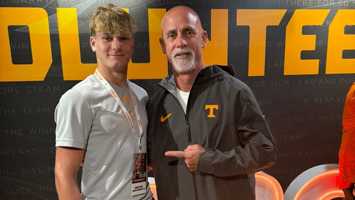 Caiden Foster on his Tennessee football visit. He is pictured with the Vols DB coach, Willie Martinez.