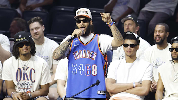 Jun 24, 2025; Oklahoma City, OK, USA; Oklahoma City Thunder forward Kenrich Williams (34) speaks to fans during the Champions Opening Ceremony for the parade inside the Paycom Center. Mandatory Credit: Alonzo Adams-Imagn Images Jun 24, 2025; Oklahoma City, OK, USA; Oklahoma City Thunder forward Kenrich Williams (34) speaks to fans during the Champions Opening Ceremony for the parade inside the Paycom Center. Mandatory Credit: Alonzo Adams-Imagn Images