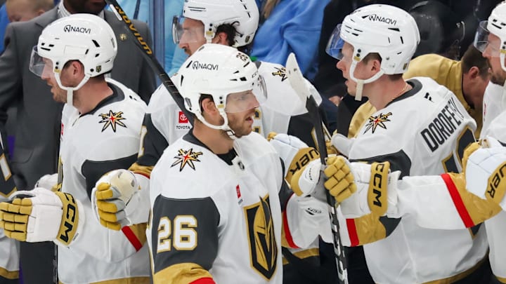 Apr 24, 2026; Salt Lake City, Utah, USA; Vegas Golden Knights center Nic Dowd (26) celebrates with teammates after scoring a goal against the Utah Mammoth during the third period in game three of the first round of the 2026 Stanley Cup Playoffs at Delta Center. Mandatory Credit: Rob Gray-Imagn Images