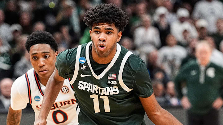 Michigan State guard Jase Richardson drives to the basket against Auburn guard Tahaad Pettiford during the first half of the Elite Eight round of the NCAA tournament at State Farm Arena in Atlanta on Sunday, March 30, 2025. Michigan State guard Jase Richardson drives to the basket against Auburn guard Tahaad Pettiford during the first half of the Elite Eight round of the NCAA tournament at State Farm Arena in Atlanta on Sunday, March 30, 2025.
