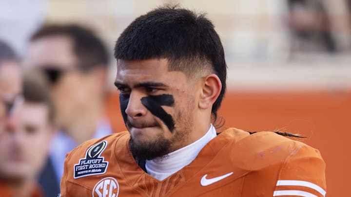 Dec 21, 2024; Austin, Texas, USA; Texas Longhorns linebacker Liona Lefau (18) against the Clemson Tigers during the CFP National playoff first round at Darrell K Royal-Texas Memorial Stadium. Mandatory Credit: Mark J. Rebilas-Imagn Images