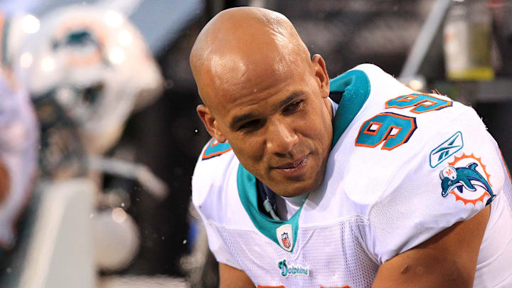 Miami Dolphins outside linebacker Jason Taylor (99) on the bench against the Buffalo Bills during the second half at Ralph Wilson Stadium in a 2011 game.