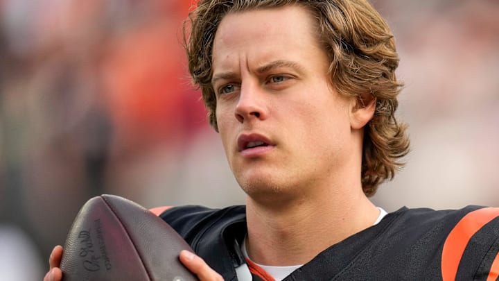 Cincinnati Bengals quarterback Joe Burrow (9) gets loose before the start of the first quarter of the NFL Week 17 game between the Cincinnati Bengals and the Arizona Cardinals at Paycor Stadium in Downtown Cincinnati on Sunday, Dec. 28, 2025. The Bengals led 23-7 at halftime. Cincinnati Bengals quarterback Joe Burrow (9) gets loose before the start of the first quarter of the NFL Week 17 game between the Cincinnati Bengals and the Arizona Cardinals at Paycor Stadium in Downtown Cincinnati on Sunday, Dec. 28, 2025. The Bengals led 23-7 at halftime.