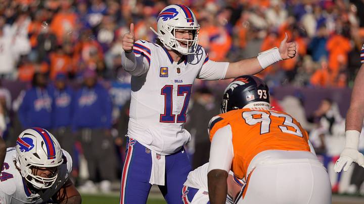 Buffalo Bills quarterback Josh Allen (17) makes a signal to his offensive line prior to taking a snap during first-half action of an NFL game between the Bills and the Denver Broncos in the AFC divisional round playoffs at Empower FIeld at Mile High in Denver, Colorado, on January 17, 2026. The Broncos defeated the Bills 33-30 in overtime to advance to the AFC championship game against the New England Patriots.
