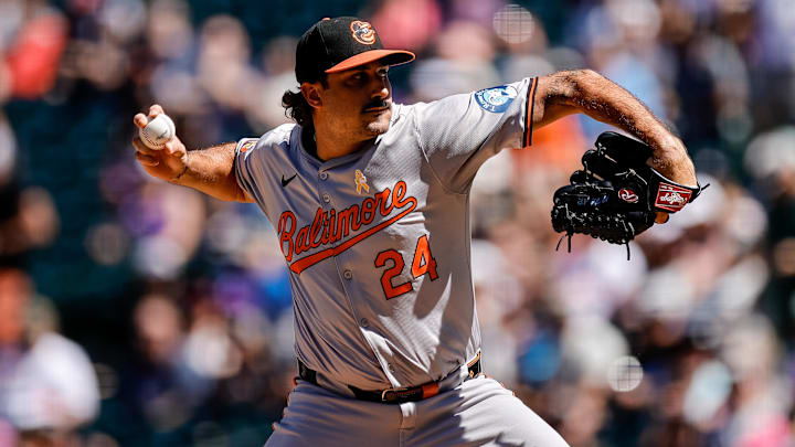 Sep 1, 2024; Denver, Colorado, USA; Baltimore Orioles starting pitcher Zach Eflin (24) pitches in the first inning against the Colorado Rockies at Coors Field. 