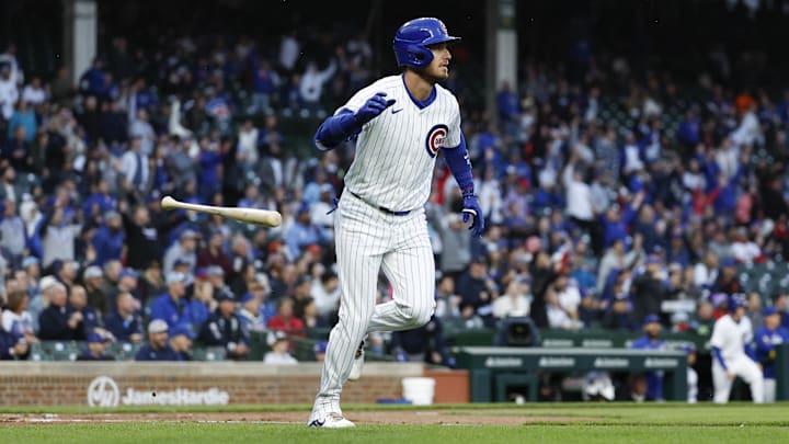 Apr 23, 2024; Chicago, Illinois, USA; Chicago Cubs outfielder Cody Bellinger (24) watches his two-run home run against the Houston Astros during the first inning at Wrigley Field.
