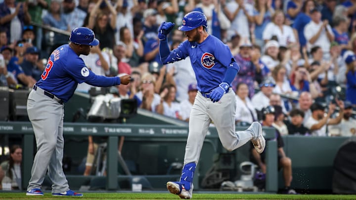 Sep 14, 2024; Denver, Colorado, USA; Chicago Cubs outfielder Cody Bellinger (24) hits a home run against the Colorado Rockies at Coors Field. 