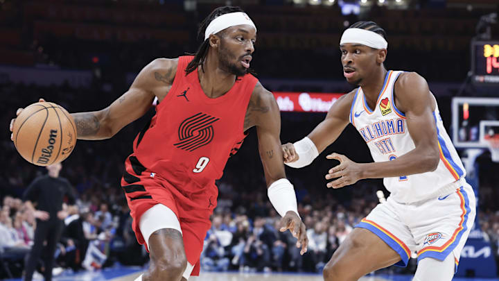 Jan 11, 2024; Oklahoma City, Oklahoma, USA; Portland Trail Blazers forward Jerami Grant (9) drives to the basket against Oklahoma City Thunder guard Shai Gilgeous-Alexander (2) during the second quarter at Paycom Center. Mandatory Credit: Alonzo Adams-USA TODAY Sports