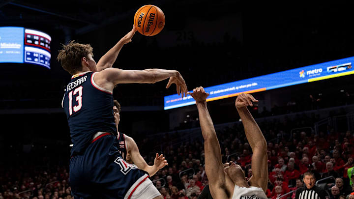 Arizona Wildcats forward Henri Veesaar (13) is called for a foul on Cincinnati Bearcats guard Dan Skillings Jr. (0) in the first half of the NCAA basketball game at the Fifth Third Arena in Cincinnati on Saturday, January 4, 2025.