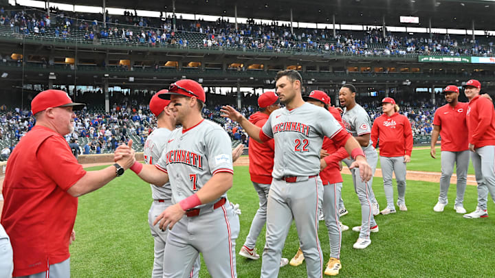 Sep 29, 2024; Chicago, Illinois, USA; The Cincinnati Reds celebrate after defeating the Chicago Cubs at Wrigley Field. Mandatory Credit: Patrick Gorski-Imagn Images