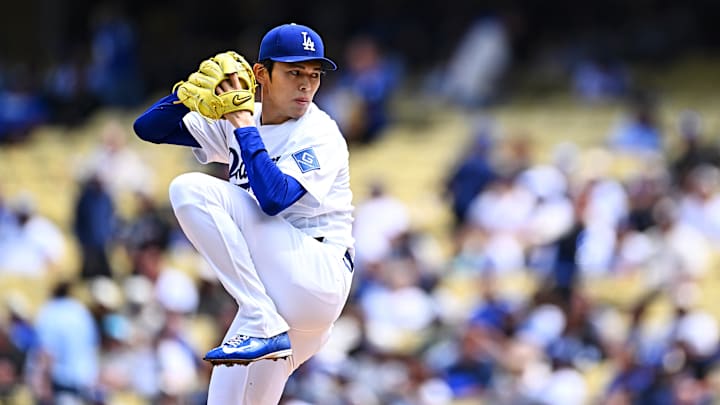 Apr 12, 2026; Los Angeles, California, USA;  Los Angeles Dodgers pitcher Roki Sasaki (11) throws a pitch during the first inning against the Texas Rangers at Dodger Stadium. Mandatory Credit: Jonathan Hui-Imagn Images