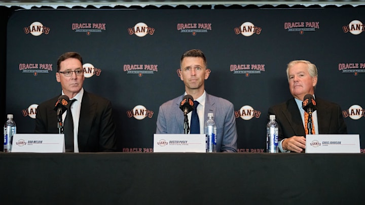 Oct 1, 2024; San Francisco, CA, USA; San Francisco Giants president of baseball operations Buster Posey (middle), manager Bob Melvin (left) and chairman Greg Johnson address the media during a press conference at Oracle Park.